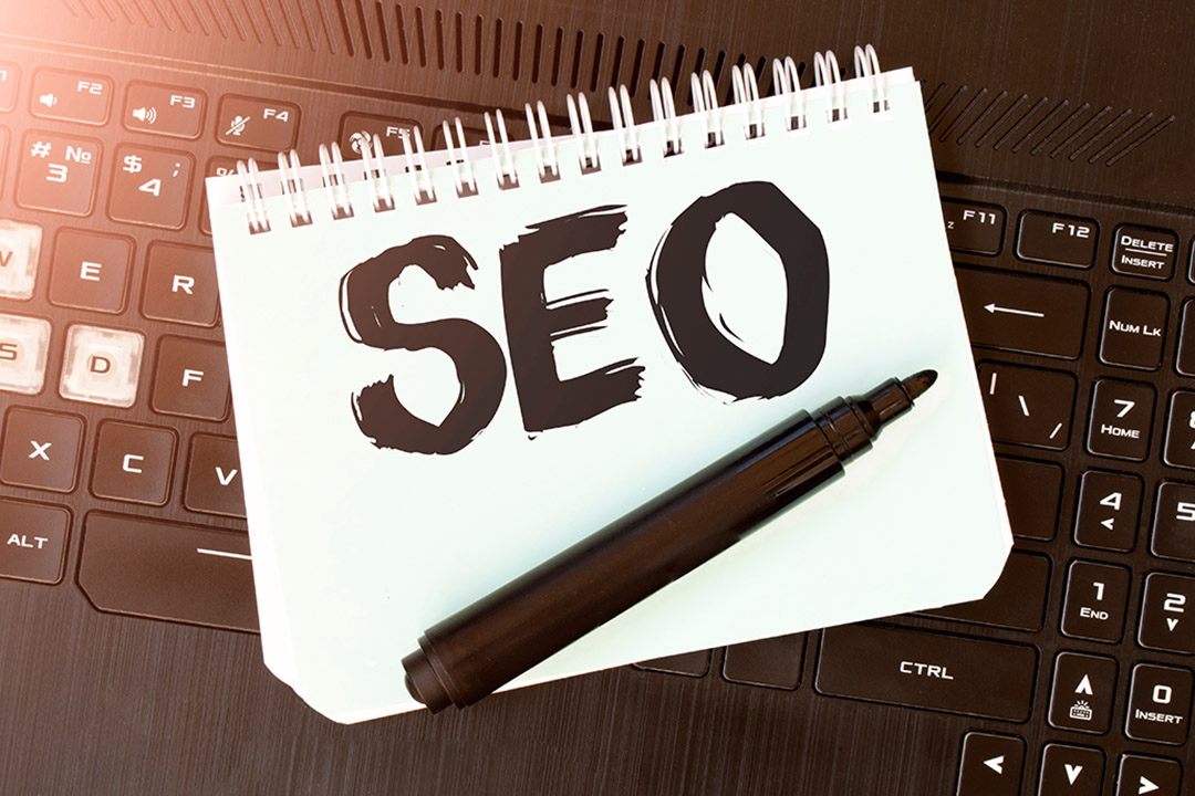 White,Paper,Sheet,With,Text,Seo,On,The,Black,Laptop